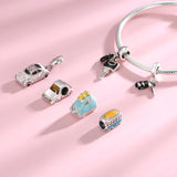 Charm bracelet with car and key charms.