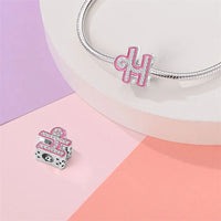 Pink and silver Libra charm.