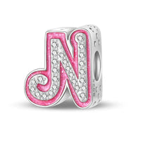 Pink and silver letter ’N’ charm.