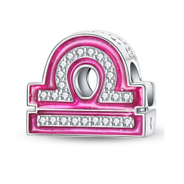 Pink and silver Libra charm.