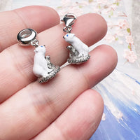Polar bear charm pendants.