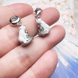 Polar bear charm pendants.