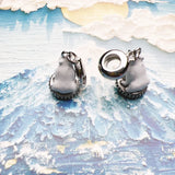 Polar bear charm pendants.
