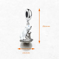 Polar bear charm with dimensions.