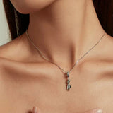 Silver necklace with pendant.