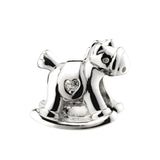 Silver rocking horse charm.