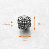 Silver crab ring with black stones.