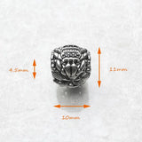 Silver crab ring with black stones.