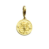 Gold scorpion charm.