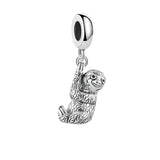 Silver sloth charm.