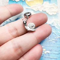 Silver snail charm.