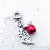 Apple and snake charm.