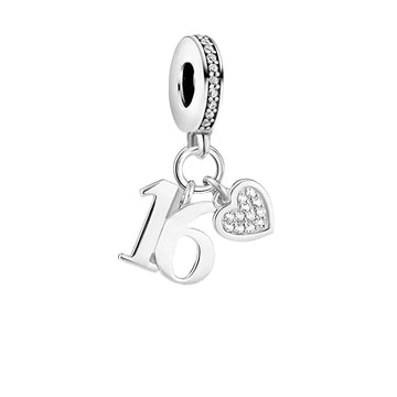 Silver charm with ’16’’ and heart.
