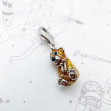 Enamel bear charm.