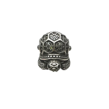 Silver turtle charm.