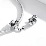 Get wild with our premium raccoon charm crafted in sterling silver