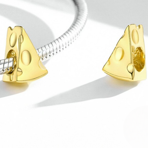 Sterling silver charm in the shape of a piece of cheese