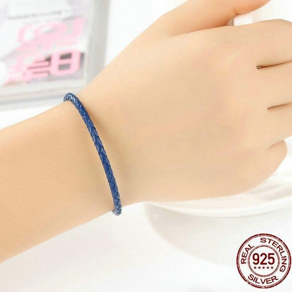 worn blue leather bracelet